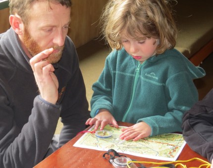 Ellora and dad practice setting a compass