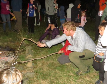Toasting marshmellows in the bonfire